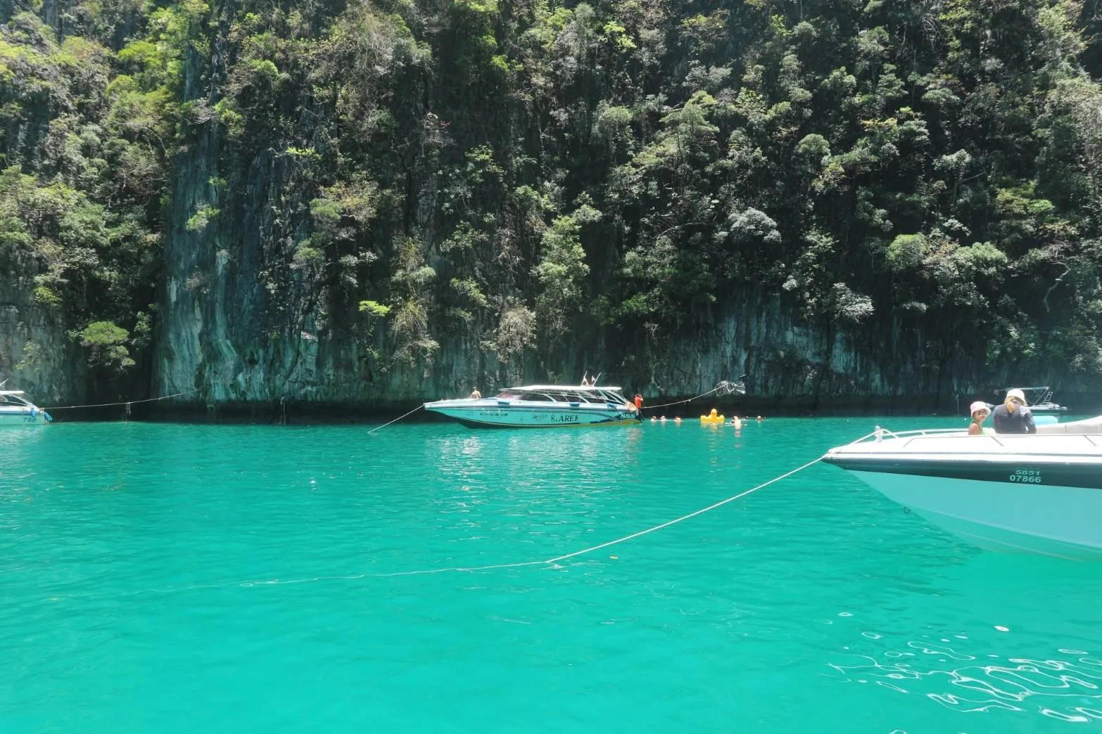 Speedboat tour to Phi Phi Island, Maya Bay, and Khai Island by YoPhuket, a one-day trip.
