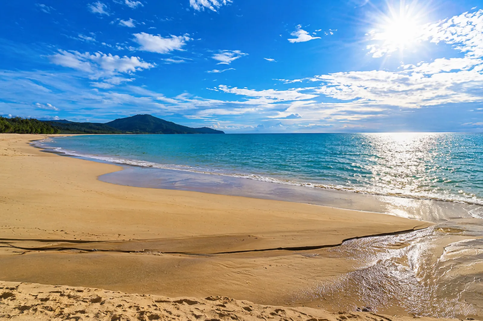 Mai Khao Beach in Phuket, a spot for plane spotting, features a long and peaceful beach.